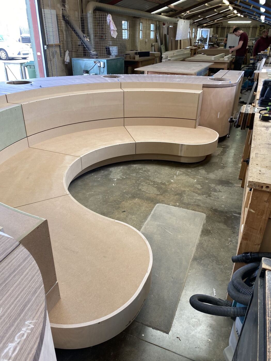Manufacturing the banquette seating in our workshop